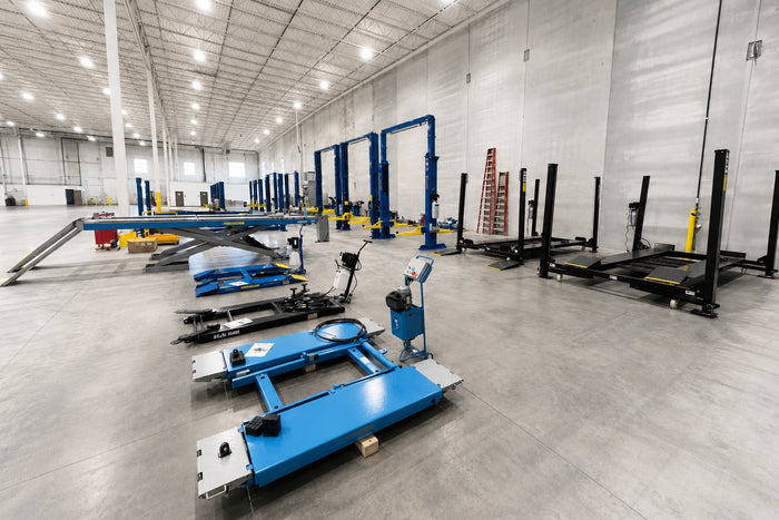 Four-Post vs. Scissor Alignment Lifts: Which Is Better?